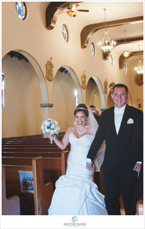 The Happy Couple Walking Down the Aisle | Our Lady of Guadalupe Church Wedding | www.KristineMariePhotography.com