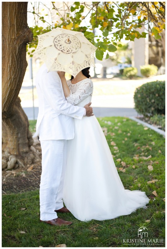 Bride & Groom Kiss Behind Umbrella | San Diego Wedding Photography | (c) Kristine Marie Photography