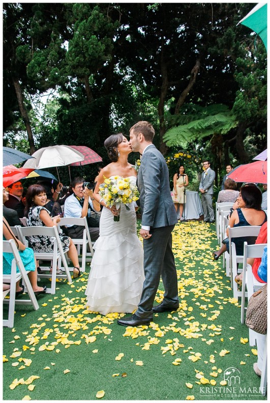 kissing in the aisle | San Diego Botanic Wedding Pictures | Kristine Marie Photography