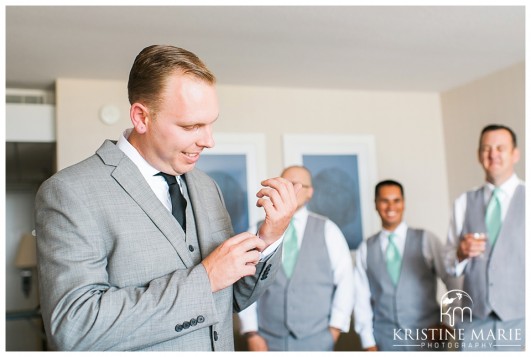 Groom Fixing his cufflink | Hyatt Regency Wedding Photographer | San Diego Wedding and Portrait Photographer | Photo by: Kristine Marie Photography