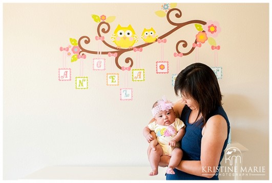 Mom Holding Baby Girl in Nursery | San Diego Newborn Baby Photographer | Kristine Marie Photography