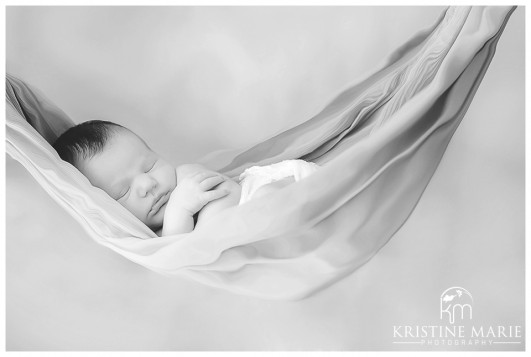 Black and White Photo of Newborn Baby in Hammock | San Diego Newborn Photographer | Kristine Marie Photography