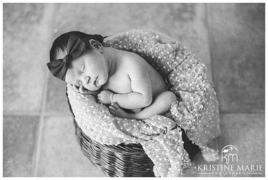 Black and White Photo of Newborn Baby with Bow | San Diego Newborn Photographer | Kristine Marie Photography