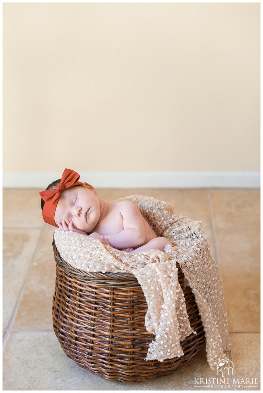 Sweet Baby wearing a Red Bow | San Diego Newborn Photographer | Kristine Marie Photography