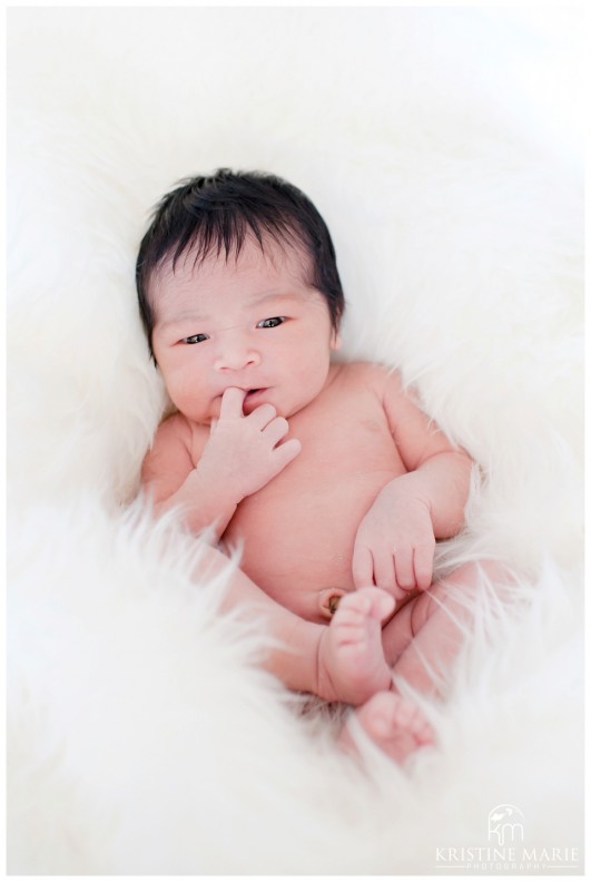 Newborn Baby Girl Looking Mischievous Photo | San Diego Newborn Baby Photographer | Kristine Marie Photography