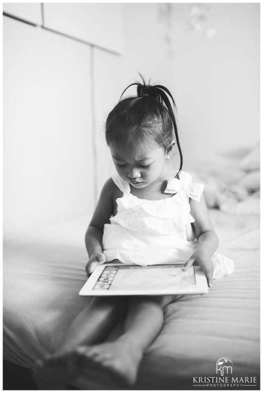 Little Girl on iPad Photo | San Diego Newborn Baby Photographer | Kristine Marie Photography