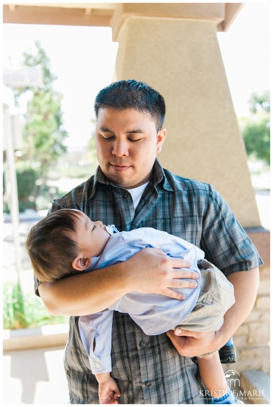 Napping in Uncle's Arms | First Birthday Party Photo | Dr. Seuss Theme | San Diego Event Photographer | Kristine Marie Photography  | © www.kristinemariephotography.com