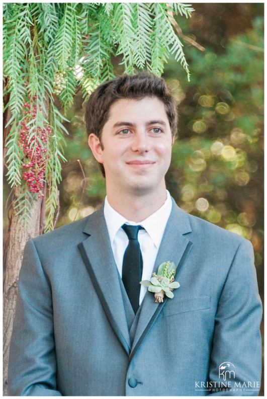 Groom's reaction to bride walking down the aisle | Temecula Creek Inn Wedding Photo | Temecula Wedding Photographer | Kristine Marie Photography | © www.kristinemariephotography.com