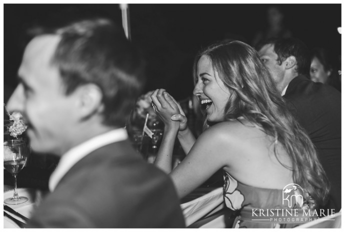 wedding guests laughing | | Temecula Creek Inn Wedding Photo | Temecula Wedding Photographer | Kristine Marie Photography | © www.kristinemariephotography.com