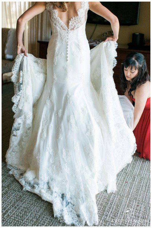 Bridesmaid helping Bride Get Ready | Temecula Creek Inn Wedding Photo | Temecula Wedding Photographer | Kristine Marie Photography | © www.kristinemariephotography.com