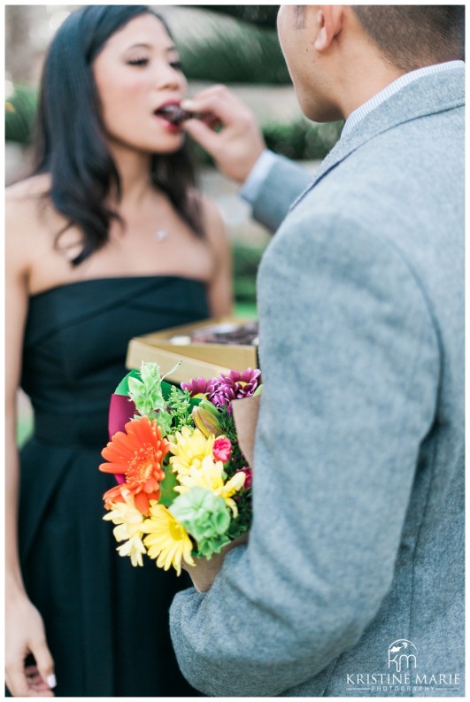 box of chocolates and flowers Geisel Library | UCSD Engagement Photo | La Jolla Engagement Wedding Photographer | © www.kristinemariephotography.com