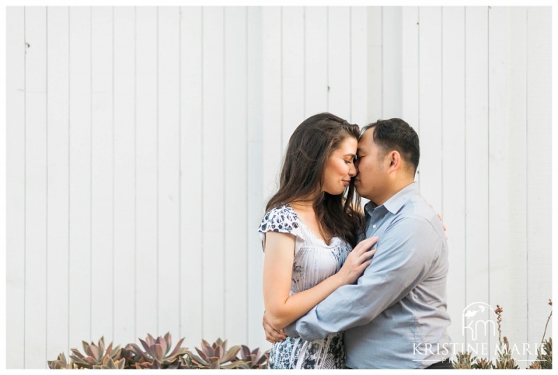 Romantic Couple kissing | Westfield UTC Mall Photos | La Jolla Engagement Photographer | Kristine Marie Photography © www.kristinemariephotography.com