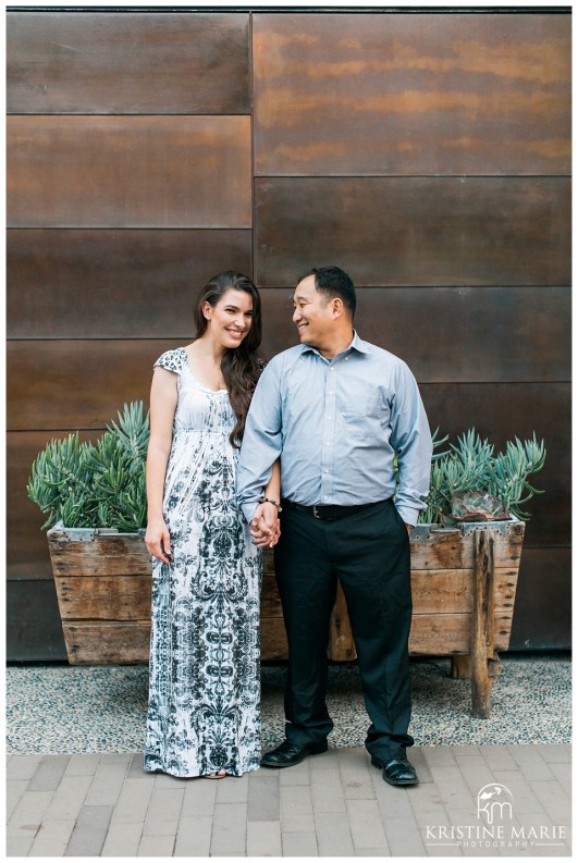 Cute couple holding hands | Westfield UTC Mall Photos | La Jolla Engagement Photographer | Kristine Marie Photography © www.kristinemariephotography.com