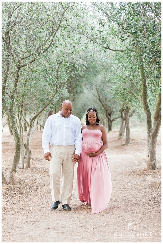 Husband and Pregnant Wife Holding Hands and Walking |  Poway San Diego Maternity Photographer | Kristine Marie Photography © www.kristinemariephotography.com