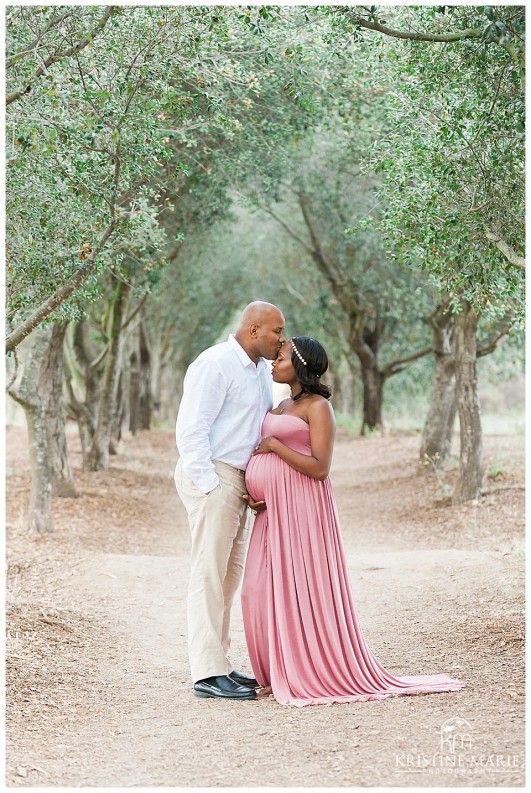 Husband Kissing Pregnant Wife on Forehead  Poway San Diego Maternity Photographer | Kristine Marie Photography © www.kristinemariephotography.com