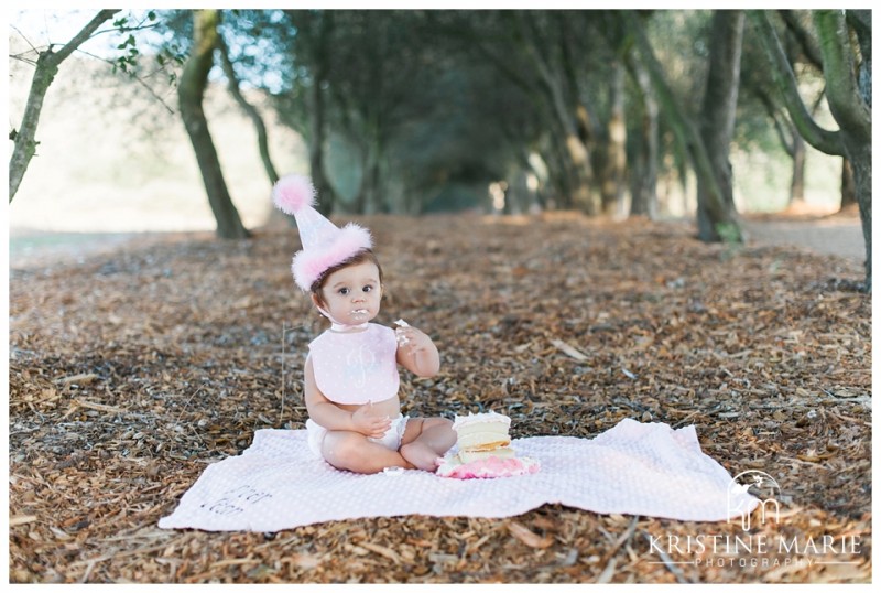 Baby Girl in Pink Hat Cake Smash First Birthday | San Diego Poway Baby Photographer | Kristine Marie Photography © www.kristinemariephotography.com 