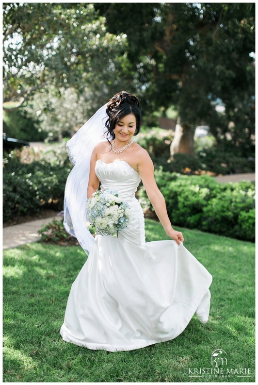 Portrait of Bride Twirling in Wedding Dress | The Thursday Club San Diego Wedding Photographer | Kristine Marie Photography | © www.kristinemariephotography.com