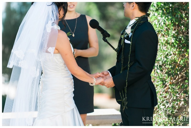 bride and groom hold hands ceremony | The Thursday Club San Diego Wedding Photographer | Kristine Marie Photography | © www.kristinemariephotography.com