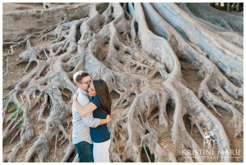 Sprawling tree roots | couple hugging | Balboa Park Engagement Photo | © Kristine Marie Photography | www.kristinemariephotography.com