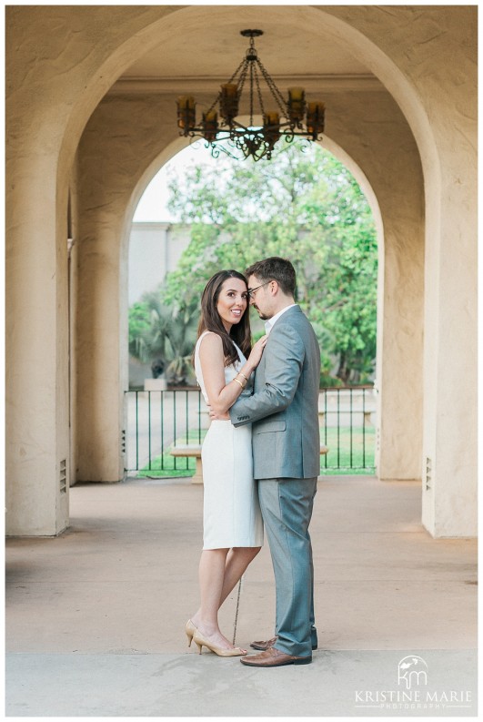 Spanish style chandelier arches | Balboa Park Engagement Photo | © Kristine Marie Photography | www.kristinemariephotography.com