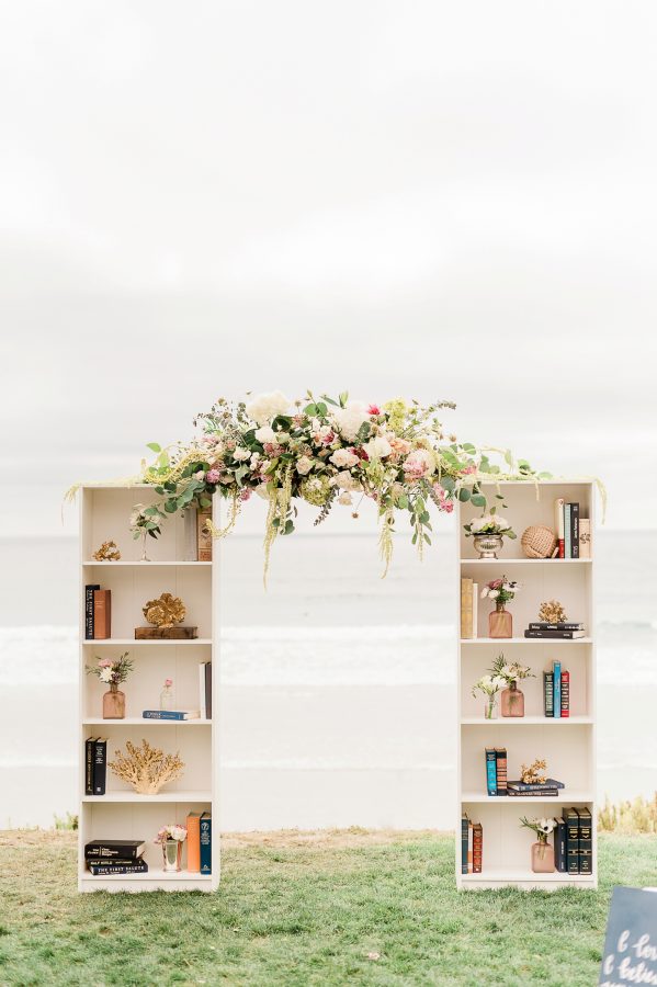 Scripps Seaside Forum La Jolla San Diego wedding bookshelf ceremony arch