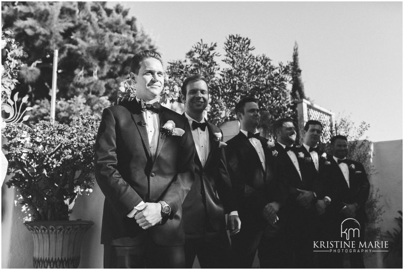 groom sees bride down the aisle | Darlington House La Jolla Wedding Photo | © Kristine Marie Photography (17)