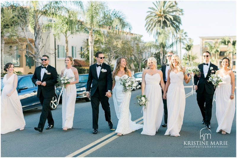 wedding party walking down the street Darlington House La Jolla Wedding Photo | © Kristine Marie Photography (42)