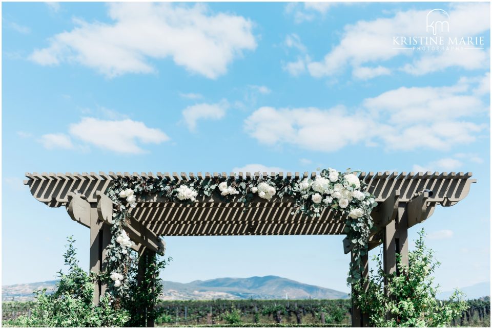 white flowers on alter Ponte Winery Wedding Photo | Temecula Photographer | © Kristine Marie Photography (45)