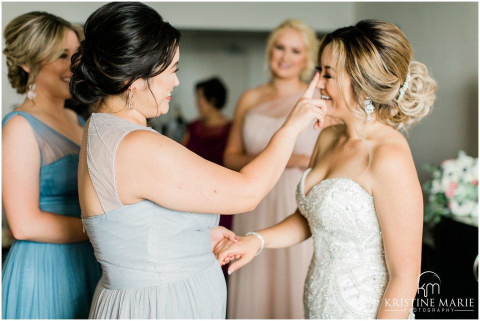 Hilton Harbor Island bride with bridesmaids getting ready | Tom Ham's Lighthouse San Diego Wedding Photo | © Kristine Marie Photography (52)