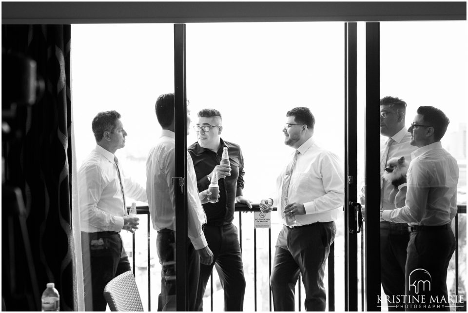 Groomsmen getting ready Hilton Harbor Island San Diego Wedding Photo | © Kristine Marie Photography 