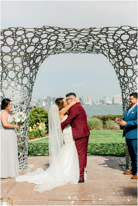 First Kiss art deco ceremony arch | Tom Ham's Lighthouse San Diego Wedding Photo | © Kristine Marie Photography (34)