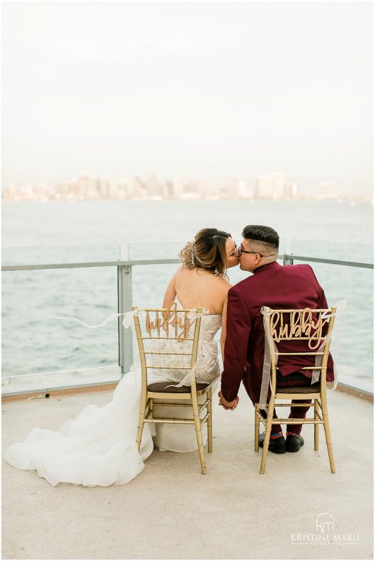 wifey hubby wood chair signs kiss skyline | Tom Ham's Lighthouse San Diego Wedding Photo | © Kristine Marie Photography (11)