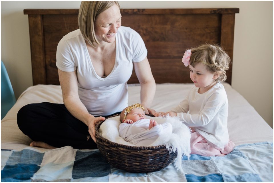 little girl with newborn baby Yokosuka Lifestyle Newborn Baby Photographer | San Diego Family Photographer © Kristine Marie Photography