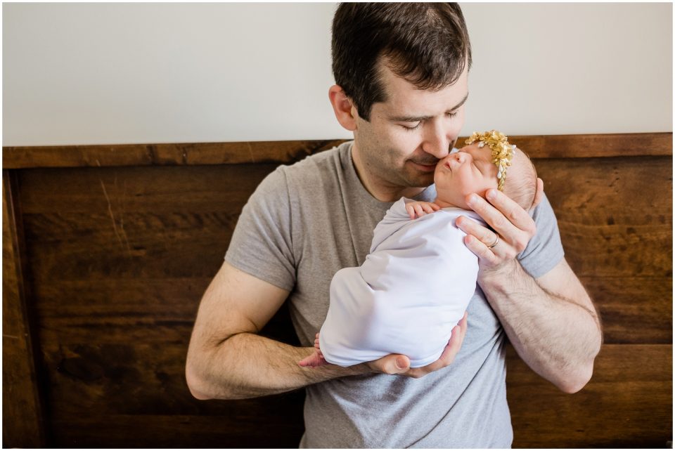 dad holding newborn Yokosuka Lifestyle Newborn Baby Photographer | San Diego Family Photographer © Kristine Marie Photography