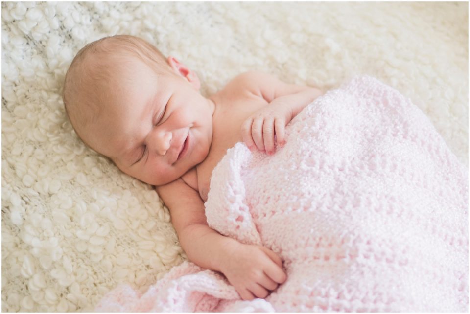 smiling newborn girl Yokosuka Lifestyle Newborn Baby Photographer | San Diego Family Photographer © Kristine Marie Photography