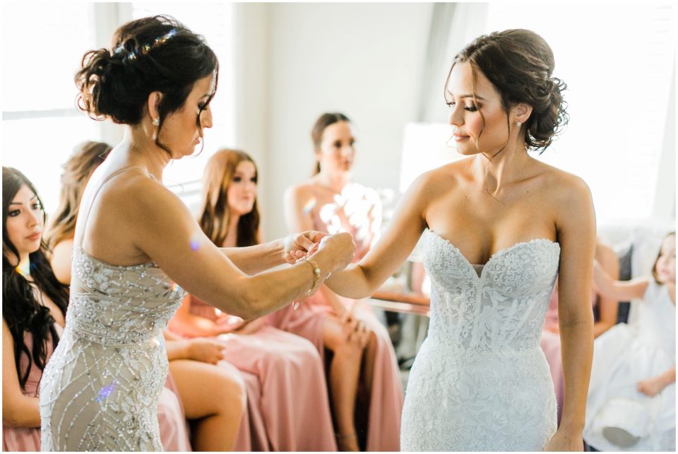 mother of bride helping getting ready photo | Temecula Ponte Winery Wedding Photographer | Kristine Marie Photography