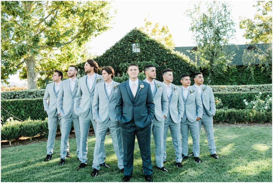 groom and groomsmen pose grey suits | Temecula Ponte Winery Wedding Photographer | Kristine Marie Photography