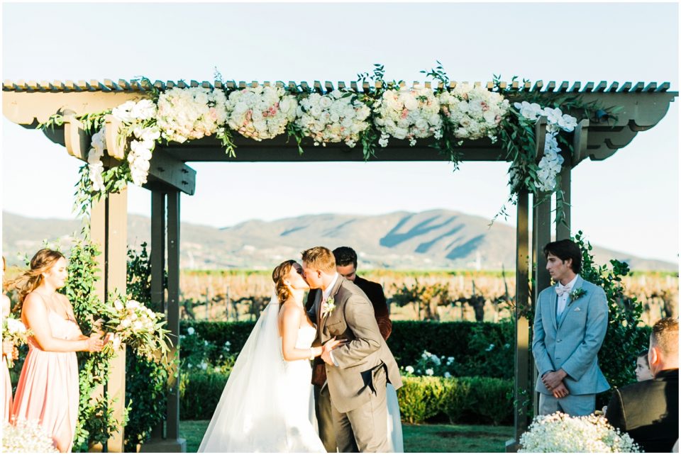 first kiss photo | Temecula Ponte Winery Wedding Photographer | Kristine Marie Photography