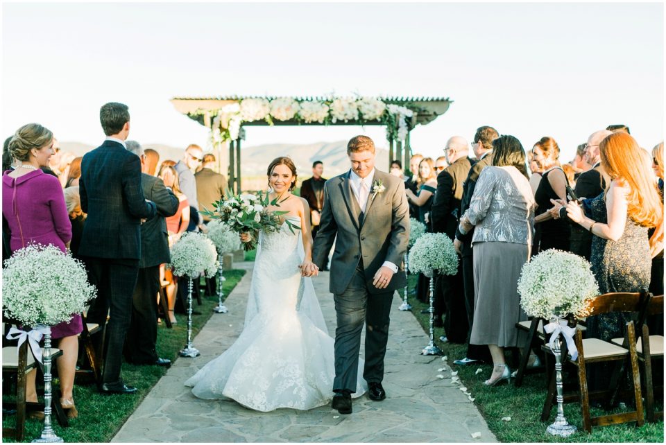 walking down the aisle together photo | Temecula Ponte Winery Wedding Photographer | Kristine Marie Photography