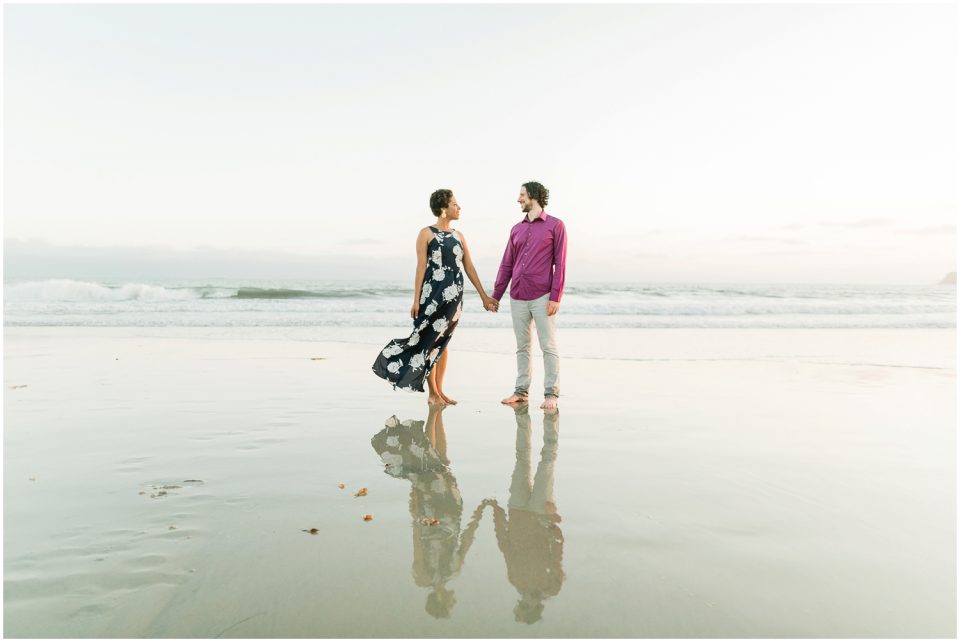 couple on beach reflection on water Hotel Del coronado Beach Engagement Pictures San Diego Engagement Photographer Kristine Marie Photography