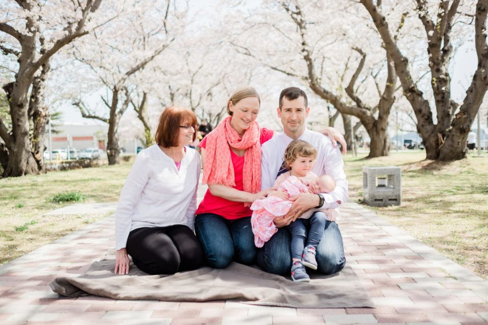 San Diego family photographer | new big sister holding newborn baby | © Kristine Marie Photography