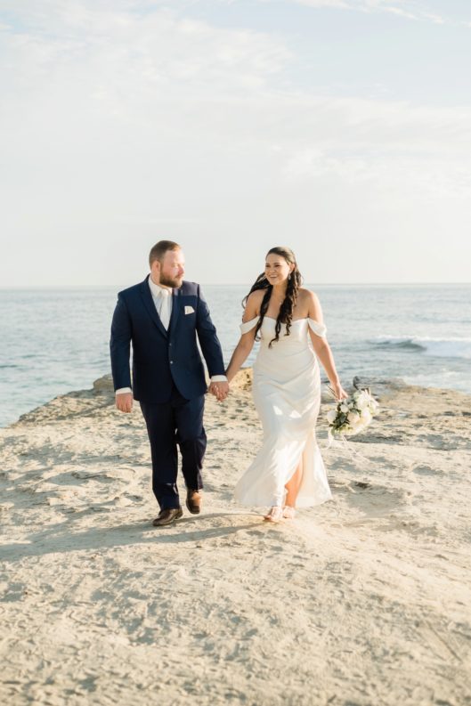 Bride and Groom Walking on Windandsea Beach San Diego Wedding Photographer © Kristine Marie Photography