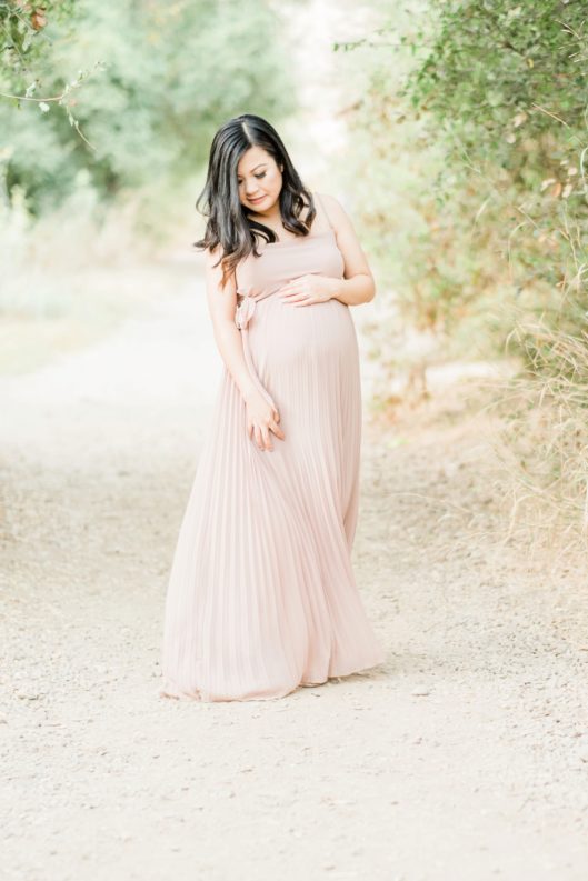 pregnant woman in blush dress Los Penasquitos Canyon Preserve San Diego Maternity Photographer | © Kristine Marie Photography