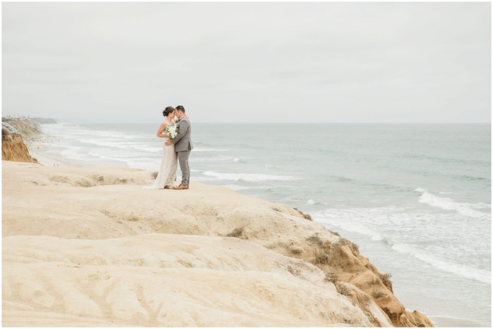 Bride and Groom on Cliffside Picture | Carlsbad Wedding Photographer | © Kristine Marie Photography