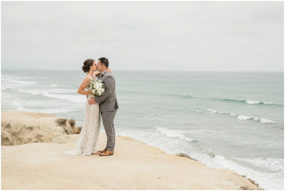 Bride and Groom on Cliffside Picture | Carlsbad Wedding Photographer | © Kristine Marie Photography