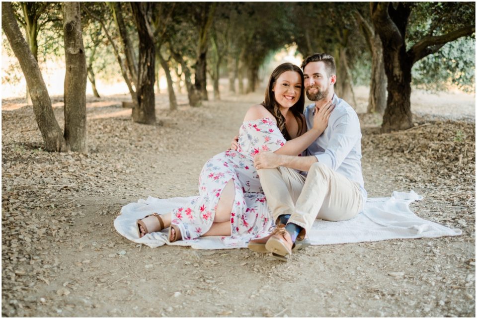 couple sitting on a blanket | San Diego Engagement Photography | © Kristine Marie Photography