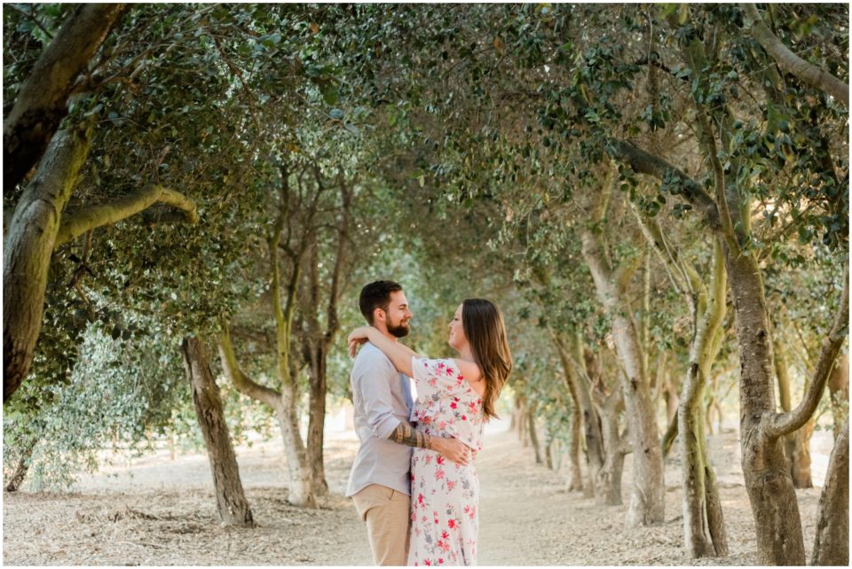 couple dancing under tunnel of trees  | San Diego Engagement Photography | © Kristine Marie Photography