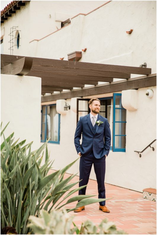 groom waiting for bride first look photo | Ole Hanson Beach Club San Clemente Wedding Photographer | © Kristine Marie Photography