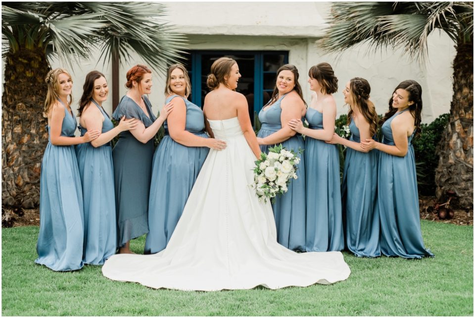 bride and bridesmaids in blue dress photo | Ole Hanson Beach Club San Clemente Wedding Photographer | © Kristine Marie Photography