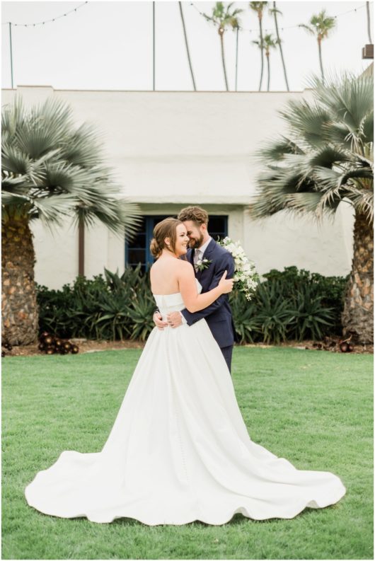 bride and groom laughing photo | Ole Hanson Beach Club San Clemente Wedding Photographer | © Kristine Marie Photography